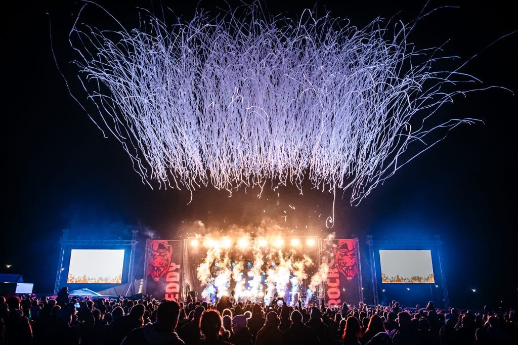 The main stage at Teddy Rocks Festival lights up with a dazzling pyrotechnics show.