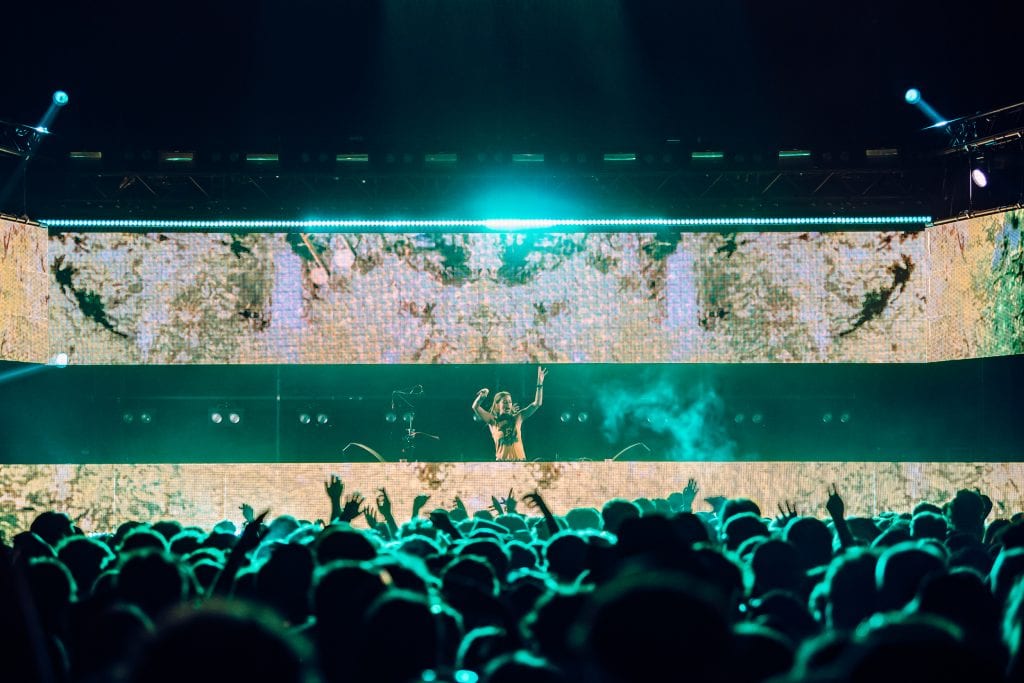 LP Giobbi electrifies Boardmasters Festival with a dynamic DJ set as the crowd dances.